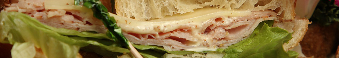 Eating Sandwich at Grit Coffee, Crozet restaurant in Crozet, VA.